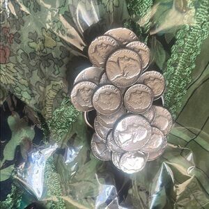 Vintage silver belt buckle made from various coins